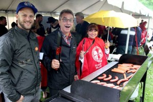 The pouring rain did not stop the IAM members from enjoying a BBQ in the park. Pictured here, we have IAM Local Lodge 2323 member Dan Jansen, IAM Canadian Airline Coordinator Carlos DaCosta and Executive Secretary Jocelyne Collett.